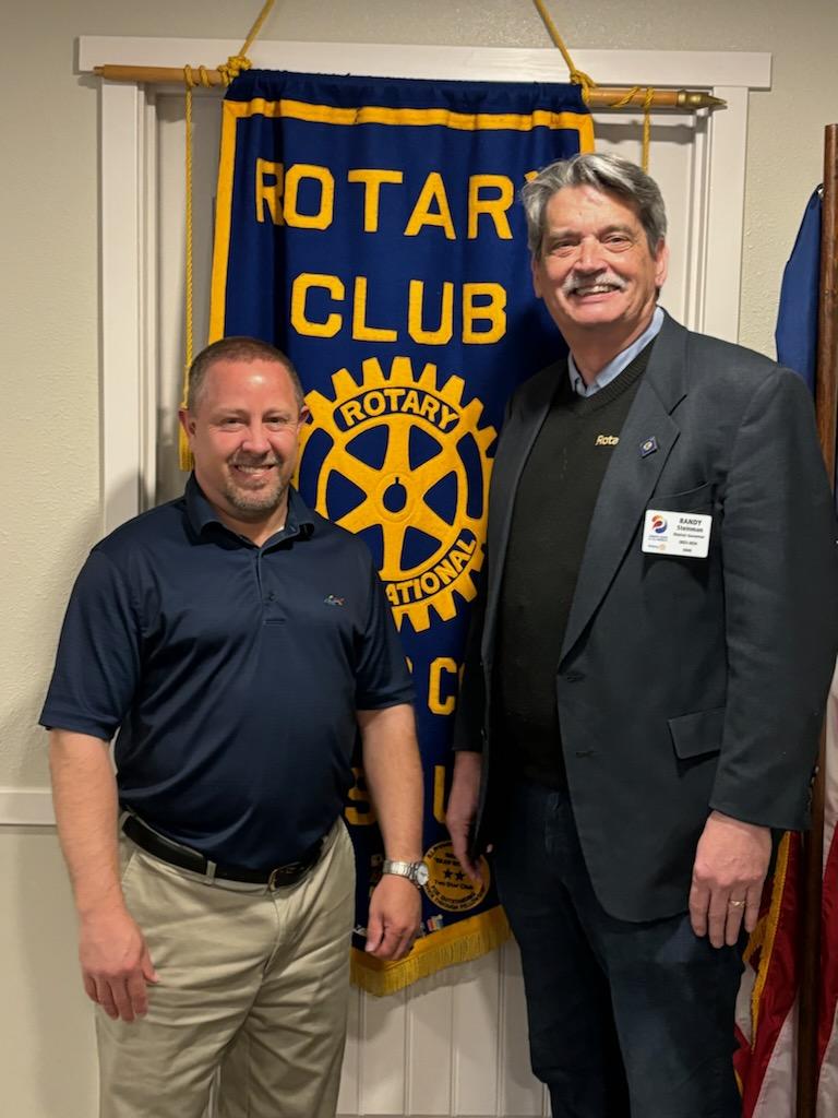 Scotland County Rotary President Corey Stott (L) with District 6040 Governor Randy Steinman (R)